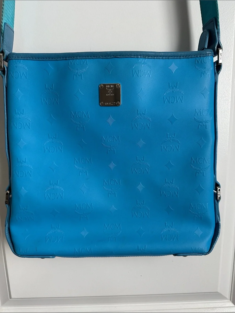 Rare MCM blue crossbody very good condition. Comes with COA.